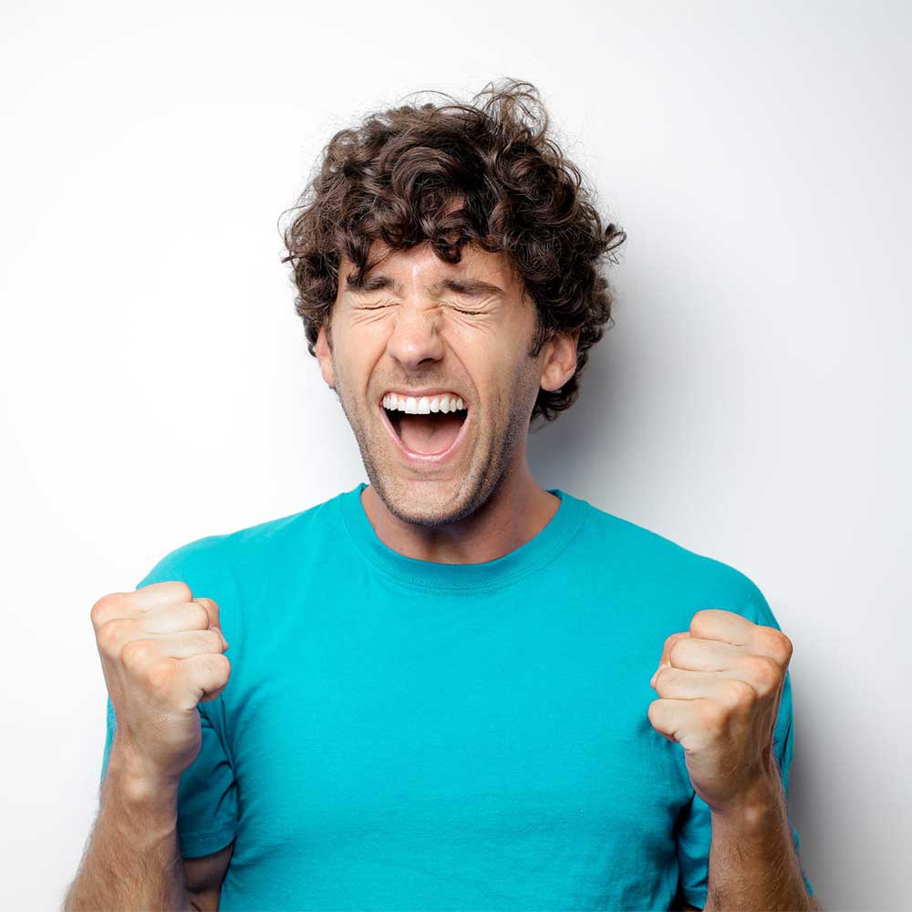 Man with a big smile and eyes closed